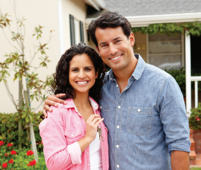 Photo of two happy home owners